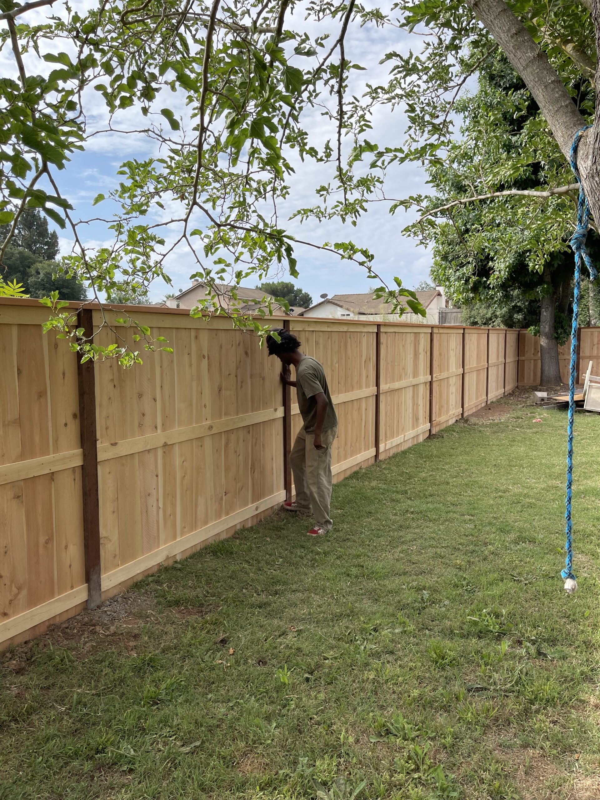 Working in San Diego doing maintenance on 6ft wooden fence.