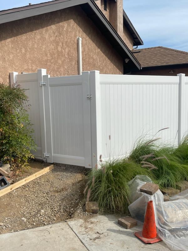 Vinyl gate and fence company installation.