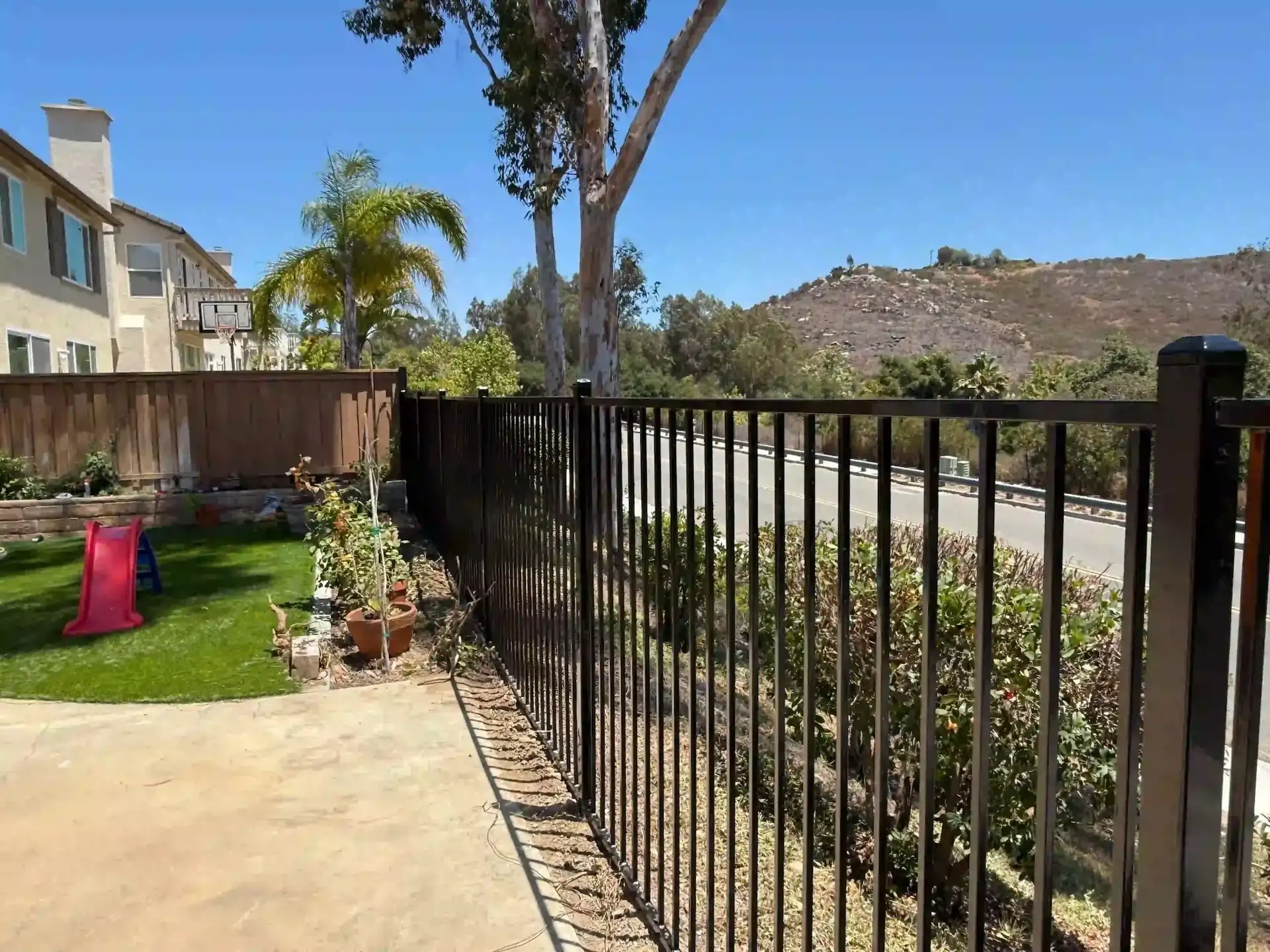 Clean new wrought iron fence installed in poway CA