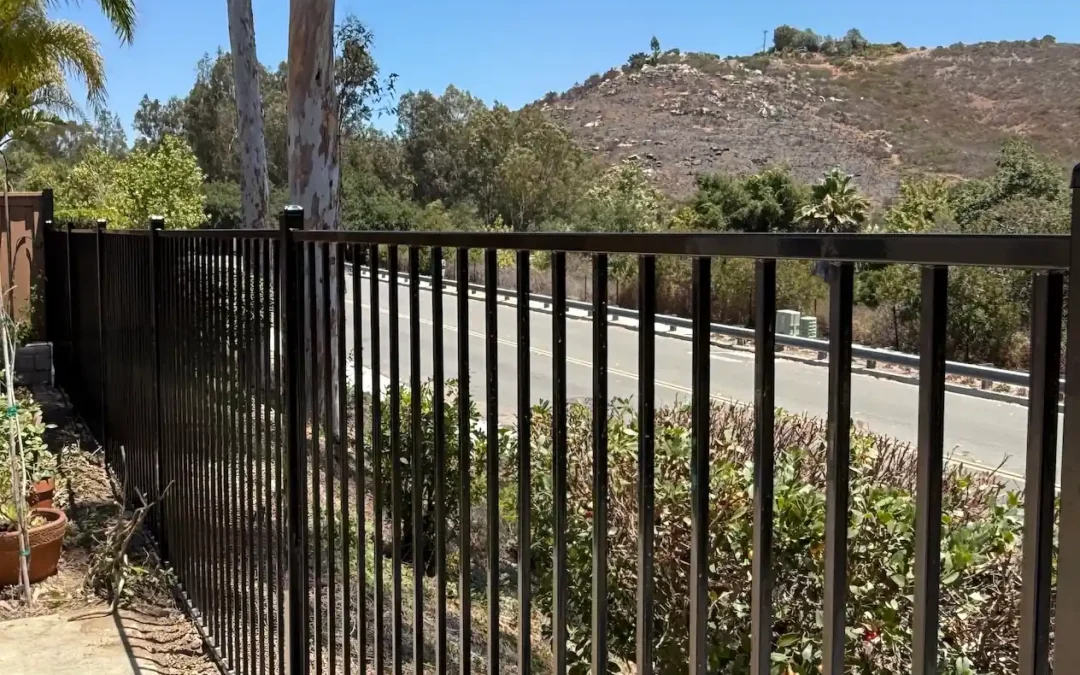 Fire-Resistant Fence Materials Compared: Aluminum vs. Wrought Iron vs. Masonry